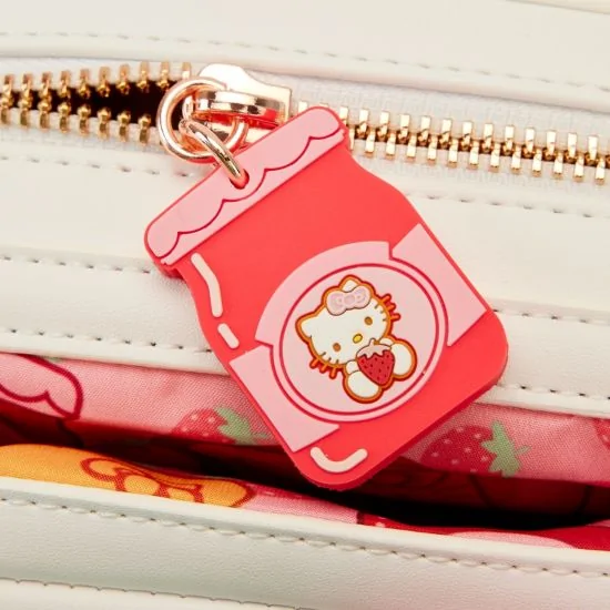 Hello Kitty purse!! love it !! Want this purse and the wallet.